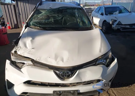 2018 Toyota Rav4 Le from USA, damaged, VIN JTMZFREV9JJ167399